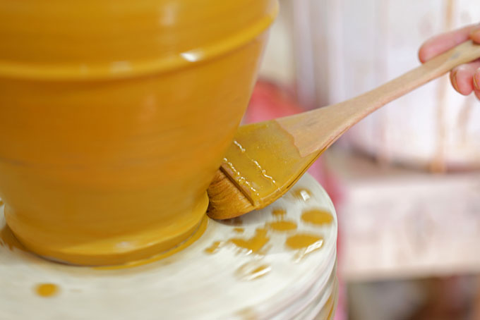 Jim Malone in 2013 - coating a bottle in slip