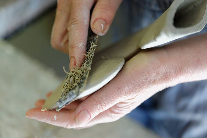 John and Jude Jelfs working together in their pottery in Bourton on the Water