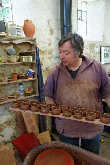 Paul Jessop at Barrington Pottery 2014 making small sauce pots