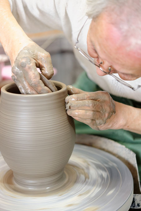 Tozan Kimura, the 17th generation of his family to head the Tokeido Pottery in Imbe, Okyama Prefecture, the centre of Bizen Yaki pottery manufacture.  After a rather awkward discussion, since he speaks virtually no English and I no Japanese he stopped what he was doing and made 3 pots to so us how he works.   